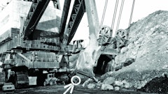 The biggest of the big: Marion’s 6360 The Captain, the largest power shovel ever built and the world’s largest land-based mobile machine until even heavier bucket wheel excavators were introduced in Germany in 1978. Note the wheel loader under the power cord takeup reel, and – if you can see them – the walking man (circled) and the operator in his compartment.