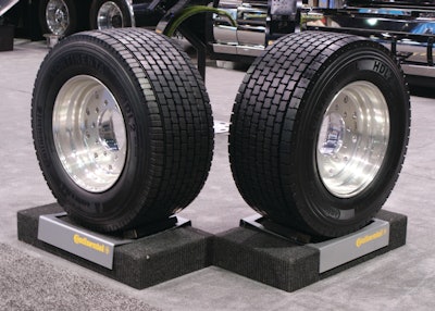 Continental’s HDL2 Eco Plus super single drive tire (left) and the HDL2 DL super single drive tire (right) on display at the Mid-America Trucking Show.
