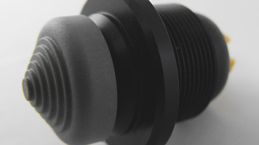 The cone shaped version of Grayhill's Series 04J joystick with integrated pushbutton.
