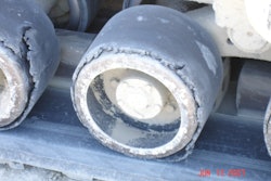 Above the wheels are debonding due to excessive heat. These wheels will completely fail within the next 50 hours.