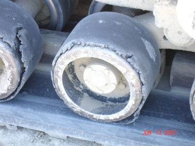 Above the wheels are debonding due to excessive heat. These wheels will completely fail within the next 50 hours.