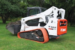 T770 With Non Marking Turf Tracks Hauling Dirt Resized