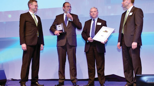 Michael Kohlem (Head of R&D CLAAS CSE), Jens Steinhardt and Andrew Mabin of Mitas, and Ruediger Mohr (Head of Corporate Purchasing CLAAS Group) at Suppliers' Day of the CLAAS Group, January 2012.
