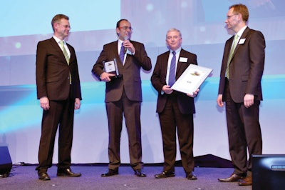 Michael Kohlem (Head of R&D CLAAS CSE), Jens Steinhardt and Andrew Mabin of Mitas, and Ruediger Mohr (Head of Corporate Purchasing CLAAS Group) at Suppliers' Day of the CLAAS Group, January 2012.