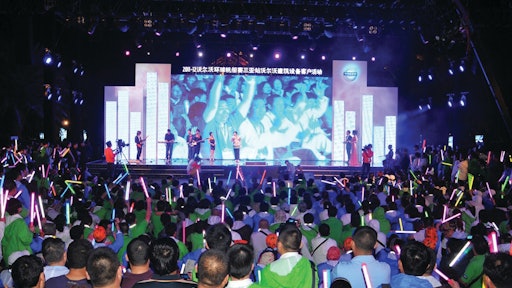A crowd of 3,000 take to the beach in Sanya for the largest Volvo CE customer event ever held in China.