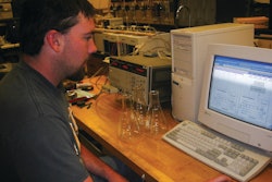 An engineering student tests the contamination levels