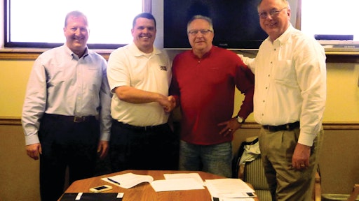 At the agreement signing ceremony recently in Hico, W.Va., were, left to right: RSL Vice President of Business Development Rick Barnes; RSL Business Development Manager Dennis Jarvis; CAI/Gauley-Robertson President Chuck Lilly; and RSL Director of Marketing Peter Gladis.