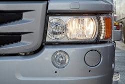 Scania's new H7 headlight with the LED daytime running lights in use.