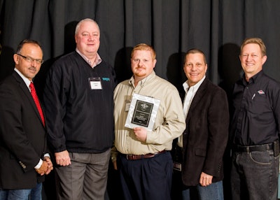 From left to right: John E. Sztykiel, President and Chief Executive Officer, Spartan Motors; Pat Wooley, Sales Director – Industrial Group, Sapa Extrusions North America; Cooper Fisher, National Accounts Manager—Transportation, Sapa Extrusions North America; Tom W. Gorman, Chief Operating Officer, Spartan Motors; W. Drew Schramm, Senior Vice President, Supply Chain Management, Spartan Motors.