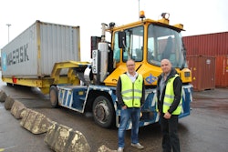 Anders Hedlund, who works in technical engineering at Älvsborg Roro, and Björn Nilsson, a Volvo Penta test engineer, stand beside the MAFI terminal tractor that is running a Volvo Penta Tier 4 Final D8 test engine at Älvsborg Roro’s Port of Gothenburg operation.