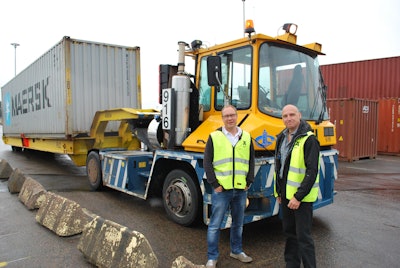 Anders Hedlund, who works in technical engineering at Älvsborg Roro, and Björn Nilsson, a Volvo Penta test engineer, stand beside the MAFI terminal tractor that is running a Volvo Penta Tier 4 Final D8 test engine at Älvsborg Roro’s Port of Gothenburg operation.
