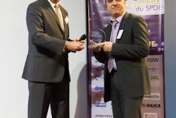 Stephane Mathieu (right), Director of Sales for South of Europe, EMEA Honeywell Sensing and Control receives supplier award on Honeywell's behalf.