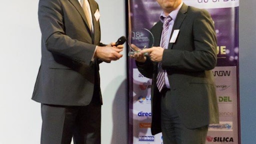 Stephane Mathieu (right), Director of Sales for South of Europe, EMEA Honeywell Sensing and Control receives supplier award on Honeywell's behalf.
