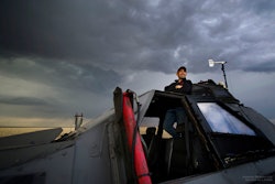 Sean Casey leans out the turret of TIV2, watching a storm forming on the horizon.