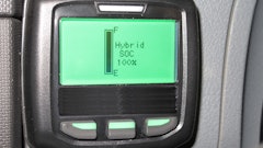 A display screen in the vehicle cab shows the state of charge for the system's lithium-ion batteries provided by Johnson Controls.