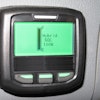 A display screen in the vehicle cab shows the state of charge for the system's lithium-ion batteries provided by Johnson Controls.