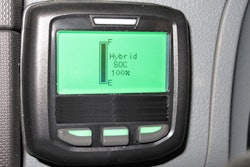 A display screen in the vehicle cab shows the state of charge for the system's lithium-ion batteries provided by Johnson Controls.
