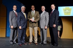 Mark Ritchey, Curry Supply Principal Partner (center) accepts the 2014 Governor’s ImPAct Award.