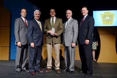 Mark Ritchey, Curry Supply Principal Partner (center) accepts the 2014 Governor’s ImPAct Award.