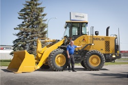 Todd Dokken, Sales Manager at Westcon Equipment and Rentals, shows off the LG938L, one of the several wheel loader models the new SDLG dealer will be offering.