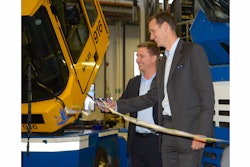 Gothenburg Roro Terminal CEO Björn Wånge (left) and Johan Carlsson, Volvo Penta Senior Vice President of Planning, Product Development and Purchasing, cut the ribbon to open the new Volvo Penta engine test center at Gothenburg Roro Terminal.