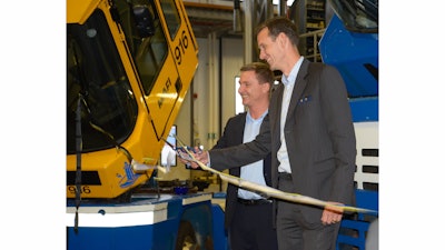 Gothenburg Roro Terminal CEO Björn Wånge (left) and Johan Carlsson, Volvo Penta Senior Vice President of Planning, Product Development and Purchasing, cut the ribbon to open the new Volvo Penta engine test center at Gothenburg Roro Terminal.