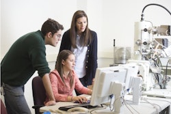 From left, WPI materials science PhD candidates Shaymus Hudson and Baillie McNally and postdoctoral student Danielle Belsito examine metal samples with a scanning electron microscope in WPI’s Materials Characterization Laboratory.
