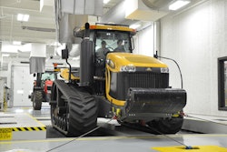 A Challenger track tractor on the chassis dynamometer which tests for proper functioning of the steering, breaks and suspension system, as well as transmission shift quality, engine performance and other functional tests.