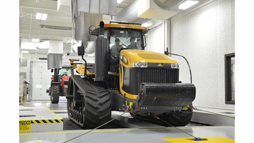 A Challenger track tractor on the chassis dynamometer which tests for proper functioning of the steering, breaks and suspension system, as well as transmission shift quality, engine performance and other functional tests.