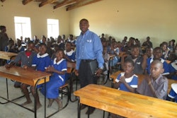 Bendix’s Martin M. M’Tambo recently returned to Kawale Primary School, which he attended as a young boy, to celebrate the completion of a classroom-construction project that he had conceived and directed under the auspices of Knorr-Bremse Global Care.