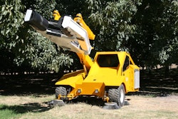 A hydraulic motor drives the internal components within the COE-designed shaker head to create a shake pattern that will remove nuts from a tree.
