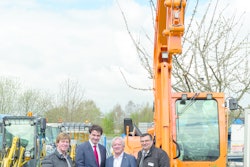 A Yanmar excavator in special green and orange painting was handed to Heiler in April 2015 (left to right Michael Heiler, Managing Director Heiler; Jean-Marc Reynaud, President Yanmar Construction Equipment Europe; Udo Heiler, Managing Director Heiler; and Manuel Lopez-Infantes, Managing Director Lopez-Infantes Baumaschinen).