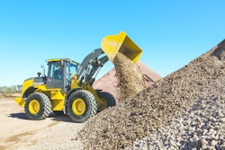John Deere’s K-Series Tier 4 Final utility wheel loaders implement excavator-style hydraulics that sense the machine’s load and deliver the flow needed for smooth combined functions and fast work cycles (read more, 12087443). A PowerShift torque-converter transmission employs Smart-Shift technology to continuously evaluate speed and load conditions. The 544K’s standard five-speed transmission with lockup torque converter in gears 2–5 offers increased acceleration, speeds cycles, and optimizes power and fuel efficiency during transport, roading, and ramp climbing. The 524K wheel loader is pictured.