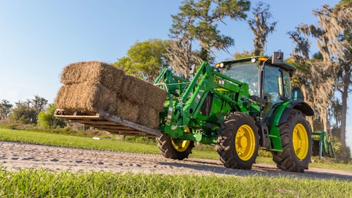 The new sloping hood on the 5E tractors allows better visibility for the operator.