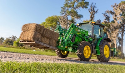 The new sloping hood on the 5E tractors allows better visibility for the operator.