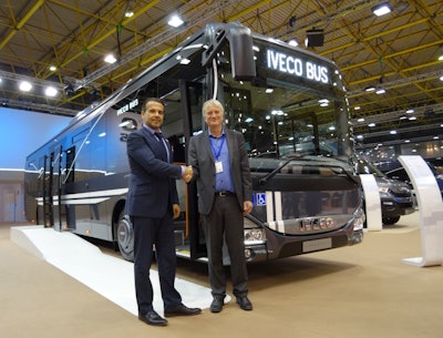 Arne Veggeland, Nettbuss CEO (right), with Paul Mechele, Head of Iveco Bus North Europe, at Busworld 2015.