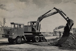 This image from a Hein-Werner advertisement illustrates one of the problems faced by a truck-mounted backhoe: When a backhoe has to be moved to continue the trench, the operator has to change cabs twice rather than simply propelling from the excavator cab.