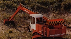 A Priestman VC15 excavator at work. The hydraulic cylinder that attaches the traveling counterweight to the boom is barely visible.