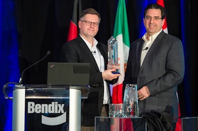 Berend Bracht, President and CEO at Bendix Commercial Vehicle Systems, accepts the Navistar Diamond Supplier award from Pat Morello, Navistar’s Director of Chassis Procurement.