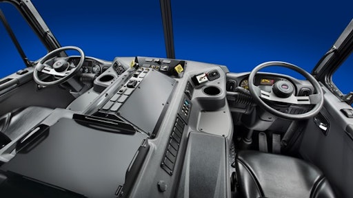 Dual-seat/dual-drive configuration within the Model 520 cab.