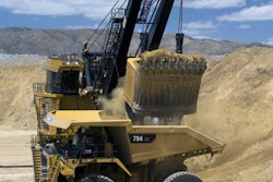 Cat 794 AC large mining truck being loaded by a Cat 7495 shovel, both of which will be on display at MINExpo 2016.