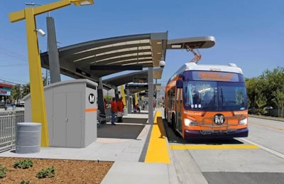 Rendering of the proposed overhead charging system for the Los Angeles County Metropolitan Transit Authority LA Metro Orange Line Electric Bus Program (New Flyer’s Xcelsior XE60 Articulated Electric Bus shown with a Siemens Overhead Rapid Charger).