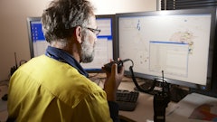 Dispatch officer addresses a system alarm raised in Hexagon Mining Fleet Management System.