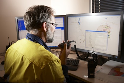 Dispatch officer addresses a system alarm raised in Hexagon Mining Fleet Management System.