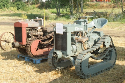 Narrow-gauge (left) and high-clearance (right) Cletrac Fs displayed by Historical Construction Equipment Assn. Board Chairman Larry Kotkowski at the HCEA’s 2011 International Convention and Old Equipment Exposition near Penfield, IL.