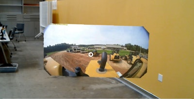 With the AR technology, operators can glance to their right to view the rearview camera display.