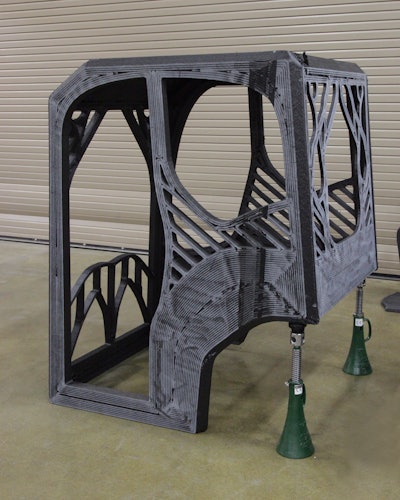 The cab designed by a University of Illinois at Urbana-Champaign student engineering team was printed at DOE’s Manufacturing Demonstration Facility at ORNL using carbon fiber-reinforced ABS plastic.