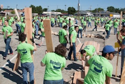 Nearly 500 Bendix volunteers gathered at the company’s headquarters in Elyria June 24, building frames for four Habitat for Humanity homes.