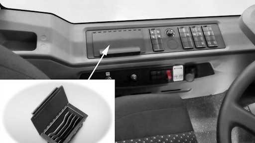 The 3D printed banknote compartment in the side panelling located on the left-hand side of the driver's area.