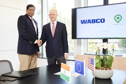 Pictured are Jacques Esculier, WABCO Chairman and Chief Executive Officer (right) and Ashok Yerneni, AssetTrackr Founder and Chief Executive Officer, following the signing ceremony in Brussels, Belgium.